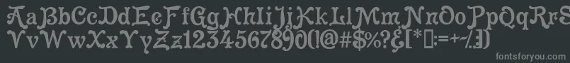 フォントCleopatra – 黒い背景に灰色の文字