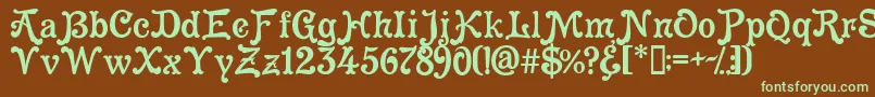 フォントCleopatra – 緑色の文字が茶色の背景にあります。