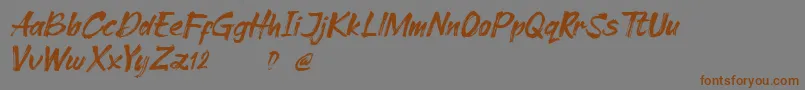 Cleopharta demo-Schriftart – Braune Schriften auf grauem Hintergrund