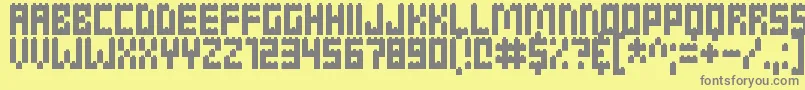 Clicky Bricks Font – Gray Fonts on Yellow Background