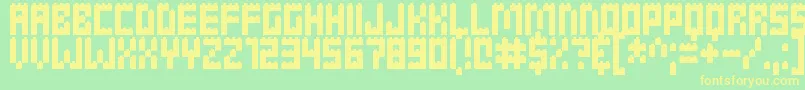 Clicky Bricks Font – Yellow Fonts on Green Background