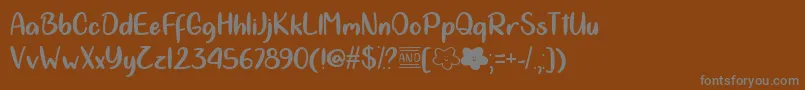 Cloud Calligraphy   Font – Gray Fonts on Brown Background