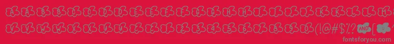 Fonte Clouds Smile Too   – fontes cinzas em um fundo vermelho