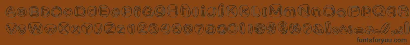 ClownShoes Font – Black Fonts on Brown Background