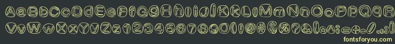 フォントClownShoes – 黒い背景に黄色の文字