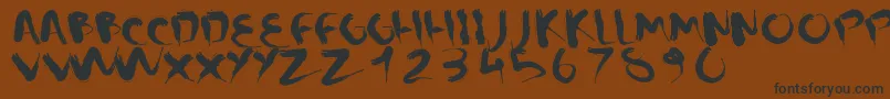 CMSquish Font – Black Fonts on Brown Background