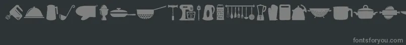Cocinitas-fontti – harmaat kirjasimet mustalla taustalla
