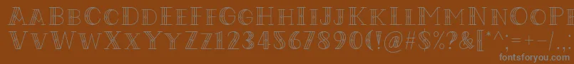 フォントCodian October Nine Font by Situjuh 7NTypes – 茶色の背景に灰色の文字