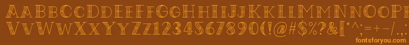 フォントCodian October Nine Font by Situjuh 7NTypes – オレンジ色の文字が茶色の背景にあります。