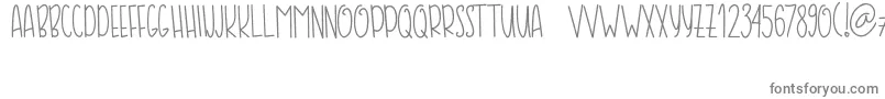 COFFE  MILK-Schriftart – Graue Schriften auf weißem Hintergrund