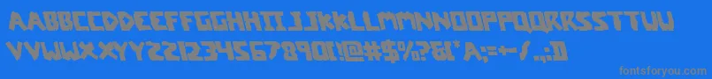 フォントcoffinstoneleft – 青い背景に灰色の文字