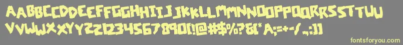 coffinstonestagrotate Font – Yellow Fonts on Gray Background
