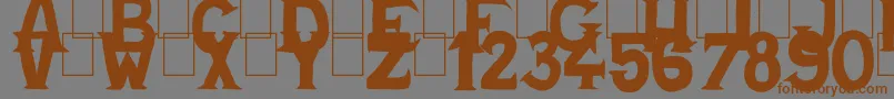 フォントCold Turkey – 茶色の文字が灰色の背景にあります。