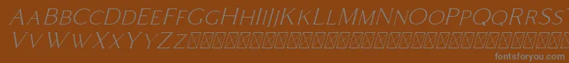 Więcej informacji o czcionce Coldiac Italic Czcionka Coldiac Italic – szare czcionki na brązowym tle