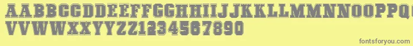 COLLEGEFREAKS Demo-fontti – harmaat kirjasimet keltaisella taustalla