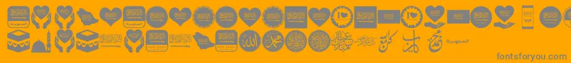 Color Saudi Arabia-fontti – harmaat kirjasimet oranssilla taustalla
