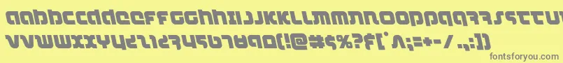 combatdroidleft-Schriftart – Graue Schriften auf gelbem Hintergrund