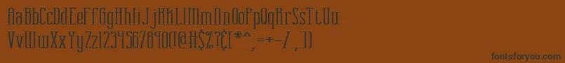 combustw-Schriftart – Schwarze Schriften auf braunem Hintergrund