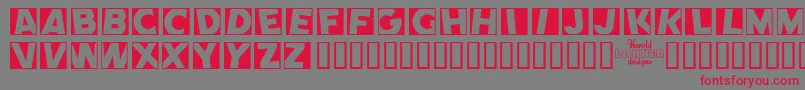 フォントCOMEN    – 赤い文字の灰色の背景