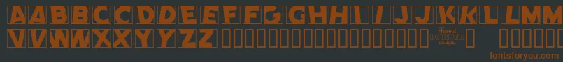 COMEP   -fontti – ruskeat fontit mustalla taustalla