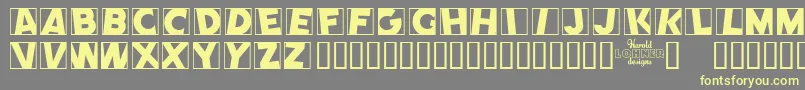 COMEP   -Schriftart – Gelbe Schriften auf grauem Hintergrund