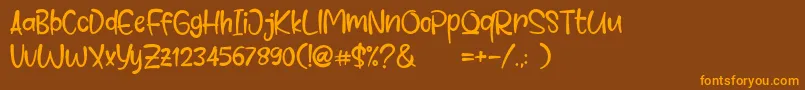 Comet Deer Font – Orange Fonts on Brown Background