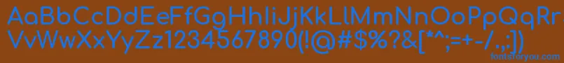 Comfortaa Bold-Schriftart – Blaue Schriften auf braunem Hintergrund