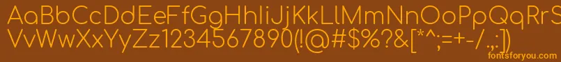 Comfortaa Light Font – Orange Fonts on Brown Background