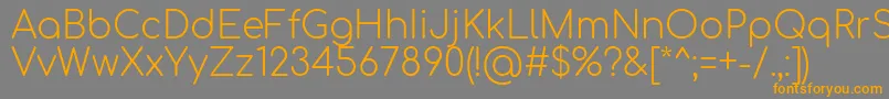 Comfortaa Light Font – Orange Fonts on Gray Background