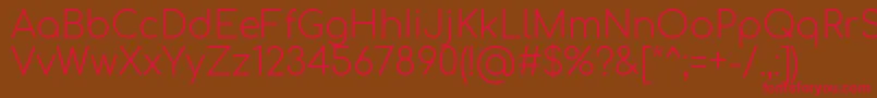 Comfortaa Light Font – Red Fonts on Brown Background