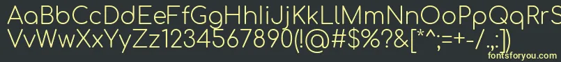 Comfortaa Light Font – Yellow Fonts on Black Background