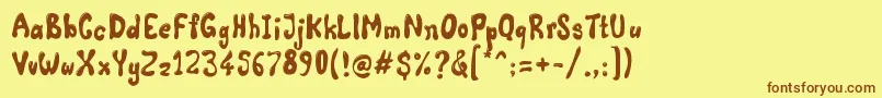 フォントComic Land Highlight – 茶色の文字が黄色の背景にあります。