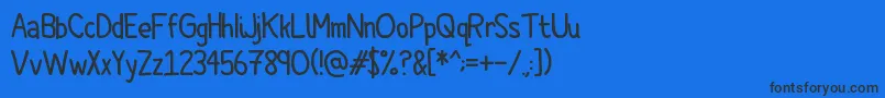 Comic Spans Font – Black Fonts on Blue Background