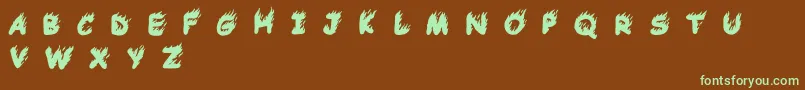 フォントComic Tragedy Base   BC – 緑色の文字が茶色の背景にあります。