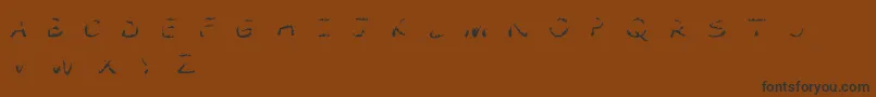 Comic Tragedy Flames   BC Font – Black Fonts on Brown Background