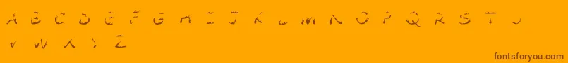 Comic Tragedy Flames   BC Font – Brown Fonts on Orange Background