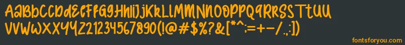 フォントComic Type Bold – 黒い背景にオレンジの文字