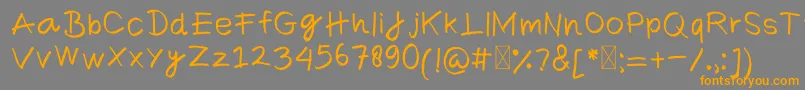 ComicaRegular Font – Orange Fonts on Gray Background