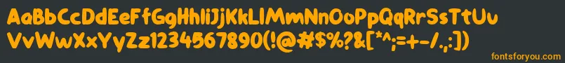 comiccomoc Font – Orange Fonts on Black Background