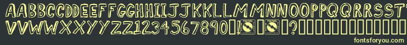COMIZ    Font – Yellow Fonts on Black Background