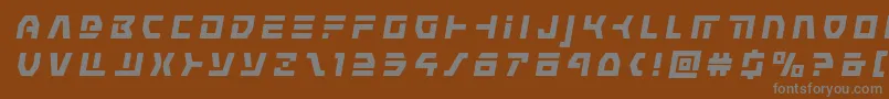 commandoverridetitleital-fontti – harmaat kirjasimet ruskealla taustalla