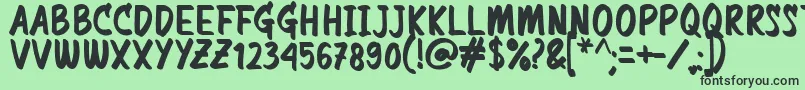 Commemorate Font – Black Fonts on Green Background