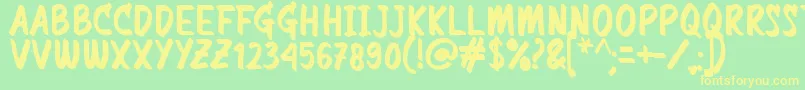 フォントCommemorate – 黄色の文字が緑の背景にあります