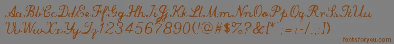 commersial script Font – Brown Fonts on Gray Background