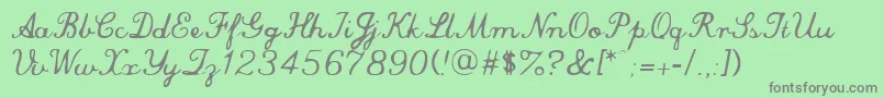 commersial script Font – Gray Fonts on Green Background