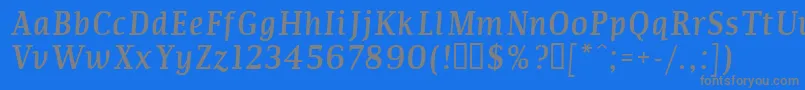 フォントCOMMI    – 青い背景に灰色の文字