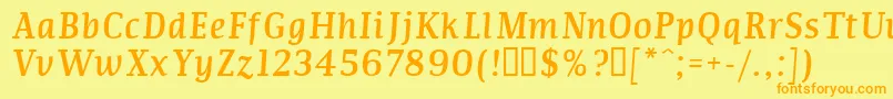 フォントCOMMI    – オレンジの文字が黄色の背景にあります。