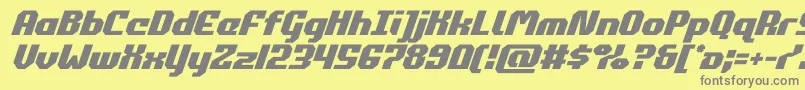 commonwealthital-fontti – harmaat kirjasimet keltaisella taustalla