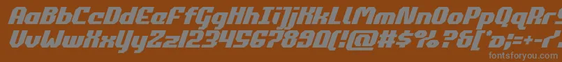 commonwealthital-fontti – harmaat kirjasimet ruskealla taustalla