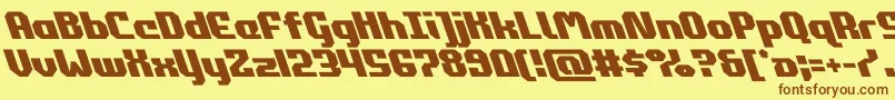 フォントcommonwealthleft – 茶色の文字が黄色の背景にあります。